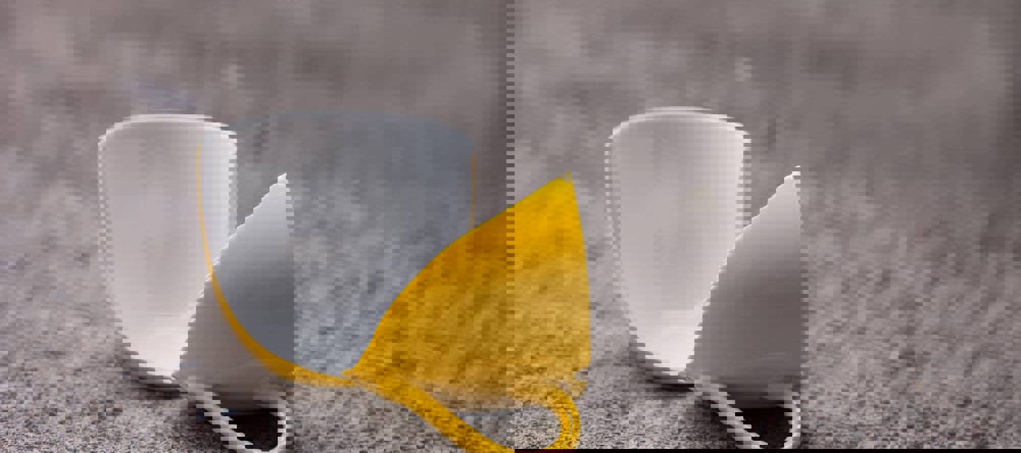 Broken coffee mug on the floor